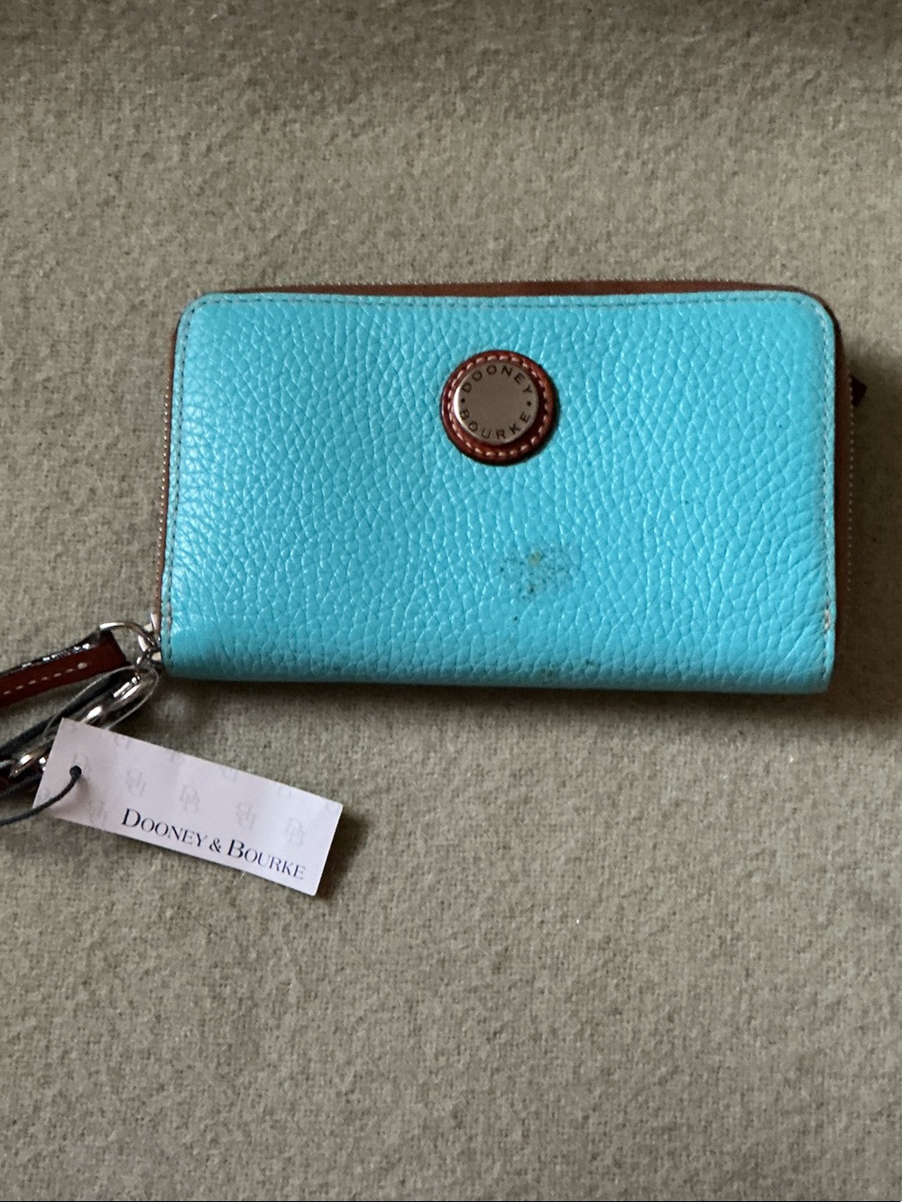Dooney & Bourke Turquoise Pebbled Leather Wristlet Wallet with Brown Trim